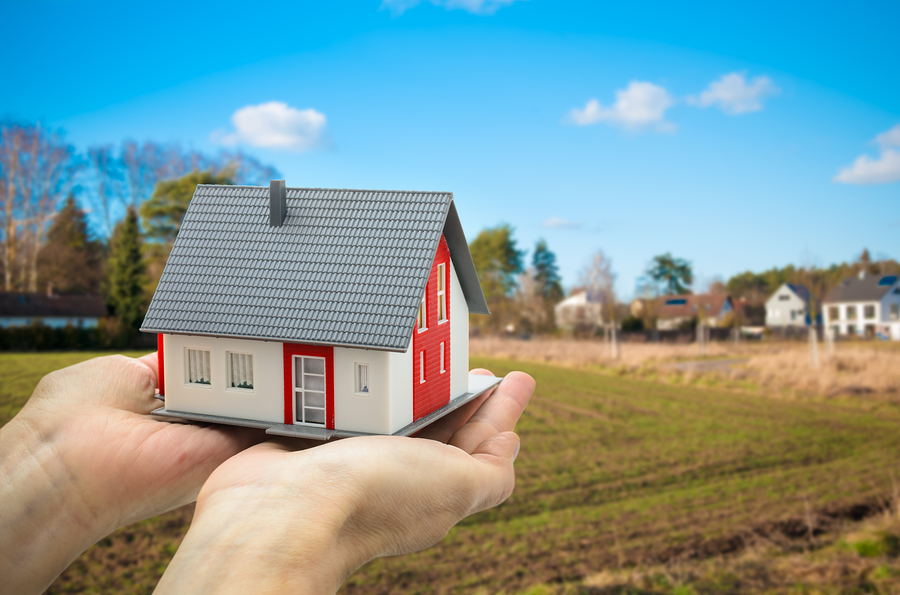 C:\Users\Sophia\AppData\Local\Microsoft\Windows\INetCache\Content.Word\bigstock-Hands-holding-a-house-model-ag-74598400.jpg