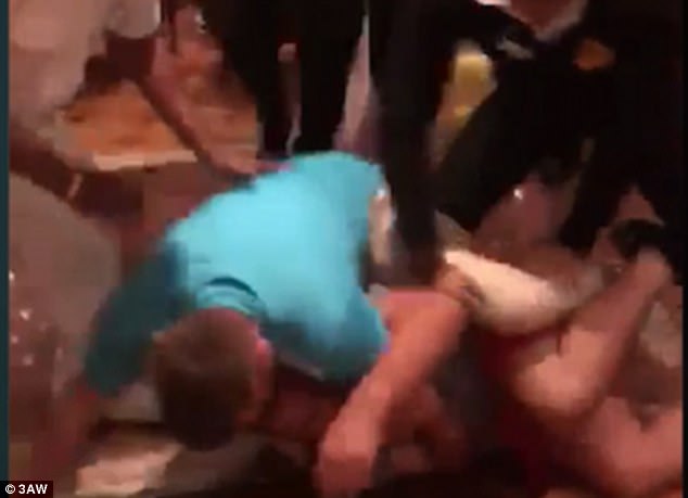 Australian guests travelling on the 10-day cruise on the Carnival Legend claim two groups of 30 warring passengers have engaged in multiple violent brawls (pictured) with threats of stabbing and to throw people overboard