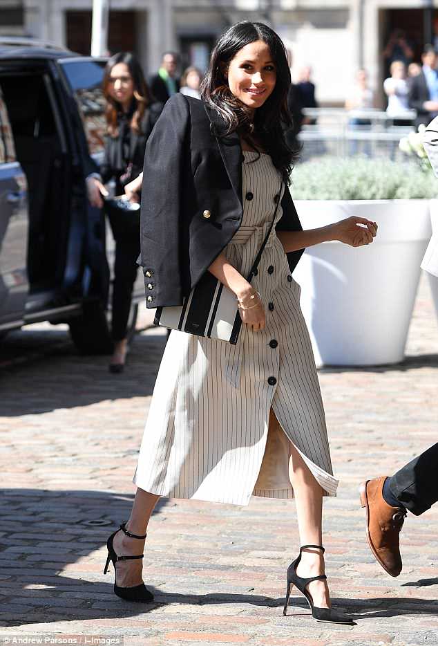 Everything she touches turns to SOLD! $295 Oroton bag sells out just hours after Meghan Markle wore it at official Commonwealth event with Prince Harry 