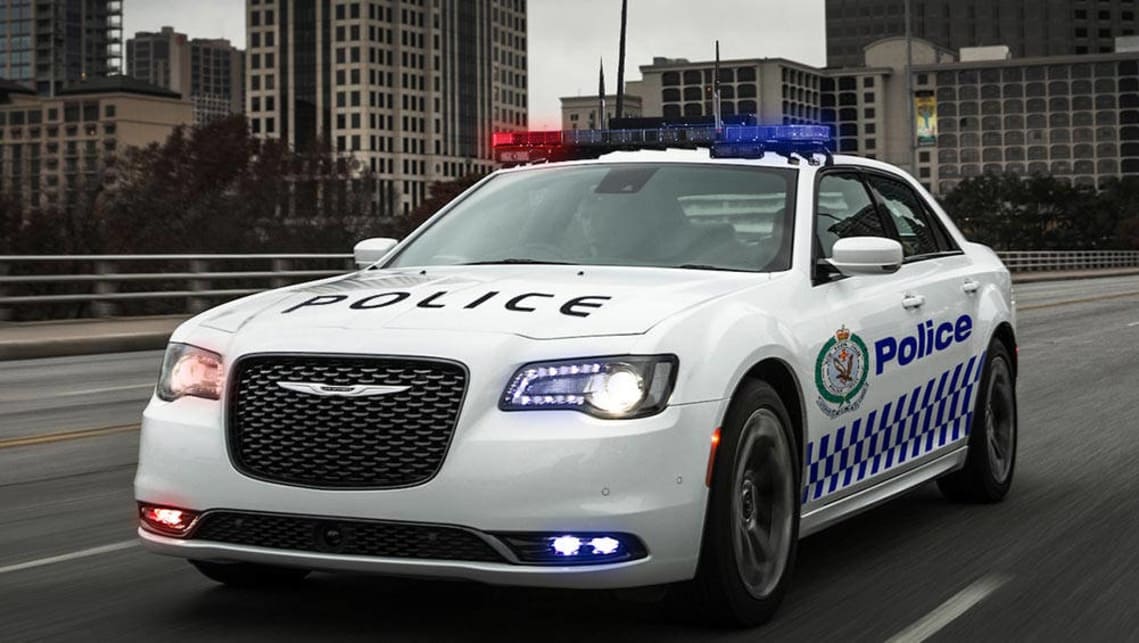 Z:\597-20180602\Draft\597-Car Guide\police\chrysler-300C-patrol-car-artists-impression-wlights.jpg