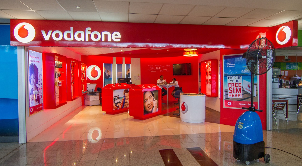 https://upload.wikimedia.org/wikipedia/commons/thumb/b/b0/Nadi_airport_-_Vodafone_office.jpg/1920px-Nadi_airport_-_Vodafone_office.jpg