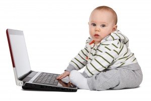 C:\Users\user\Downloads\portrait-of-baby-boy-playing-on-laptop.jpg