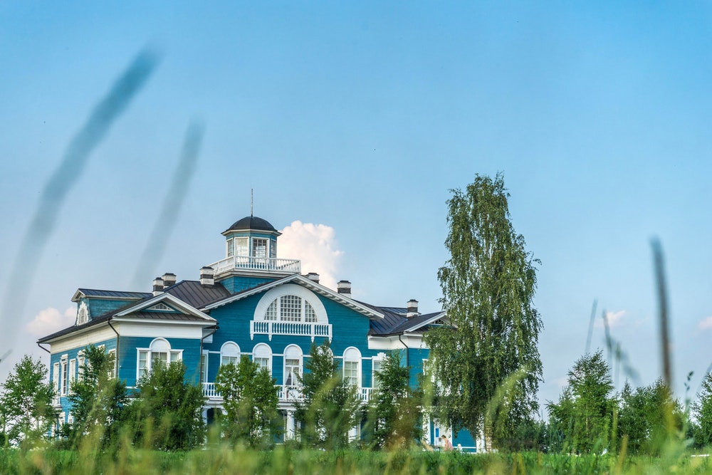 photo of white and blue house