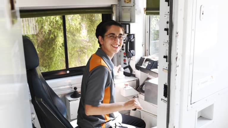 Train driver Thea Pratt prepares to depart Lidcombe station.