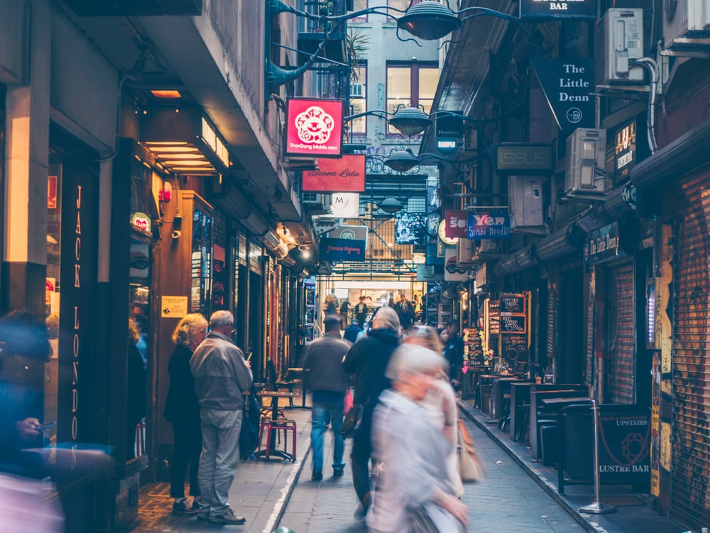 people walking on alley