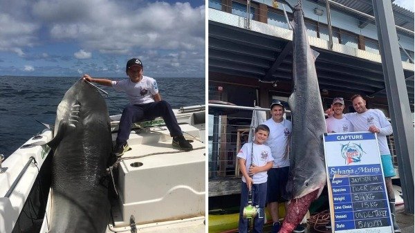 许多人都喜欢钓鱼，并把它当作生活的休闲活动。日前一名澳洲男童与父亲搭船至雪梨的外海钓鱼，却拉起了一条刷新世界记录的虎鲨。