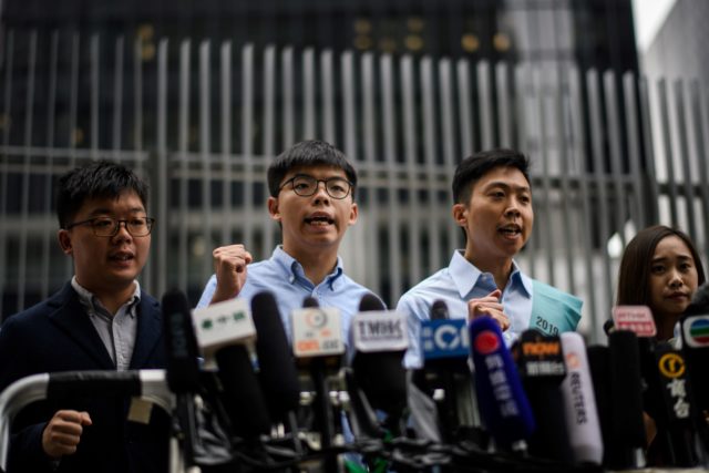 香港众志秘书长黄之锋会见传媒。（图片来源：ANTHONY WALLACE/AFP via Getty Images）