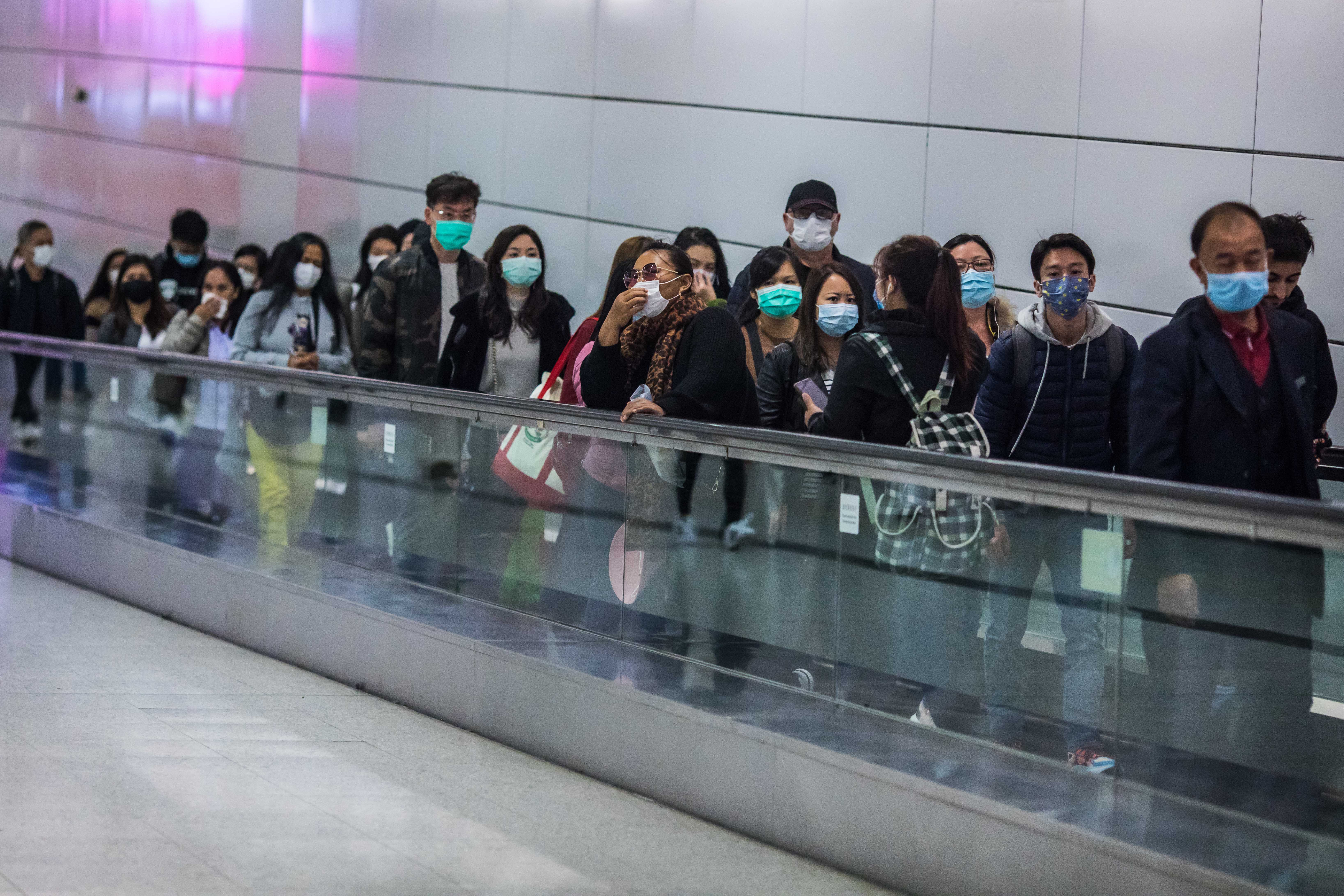 武汉肺炎疫情迅速波及全球（图片来源：DALE DE LA REY/AFP via Getty Images)