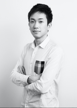 A person standing posing for the camera Description automatically generated